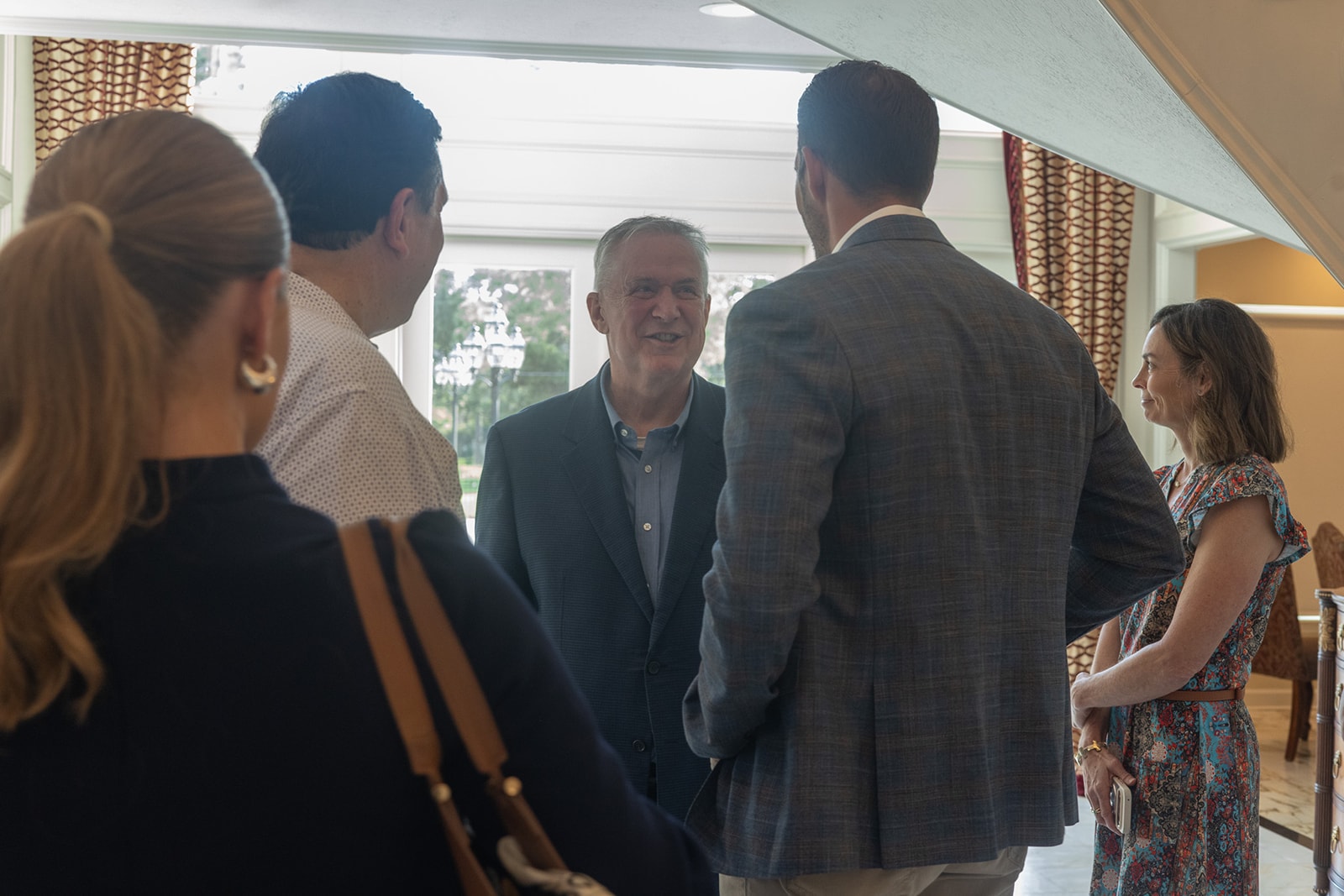 Guests networking at a Youth Leadership event